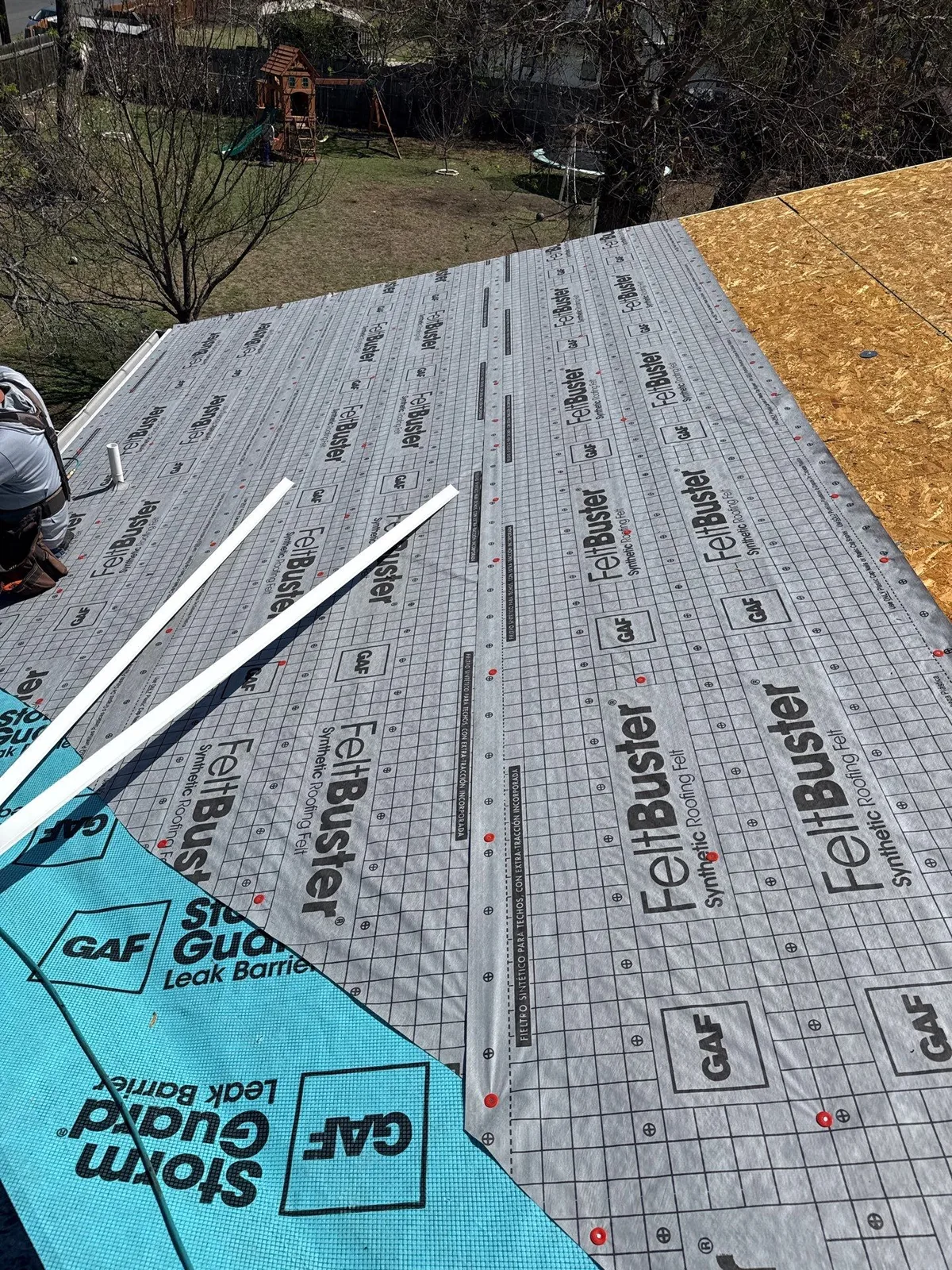 GAF FeltBuster synthetic underlayment and StormGuard leak barrier installed on a roof replacement in Manchaca, Texas