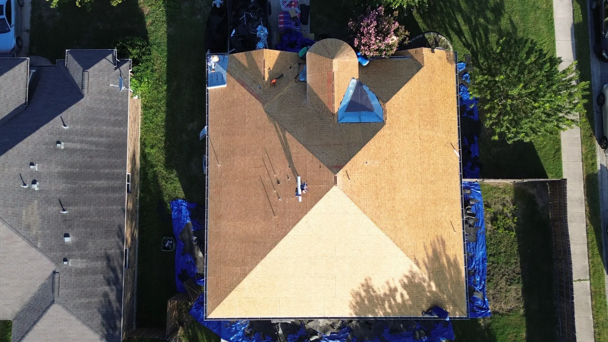 Bare OSB decking aerial during Roof Royale roof replacement deck preparation