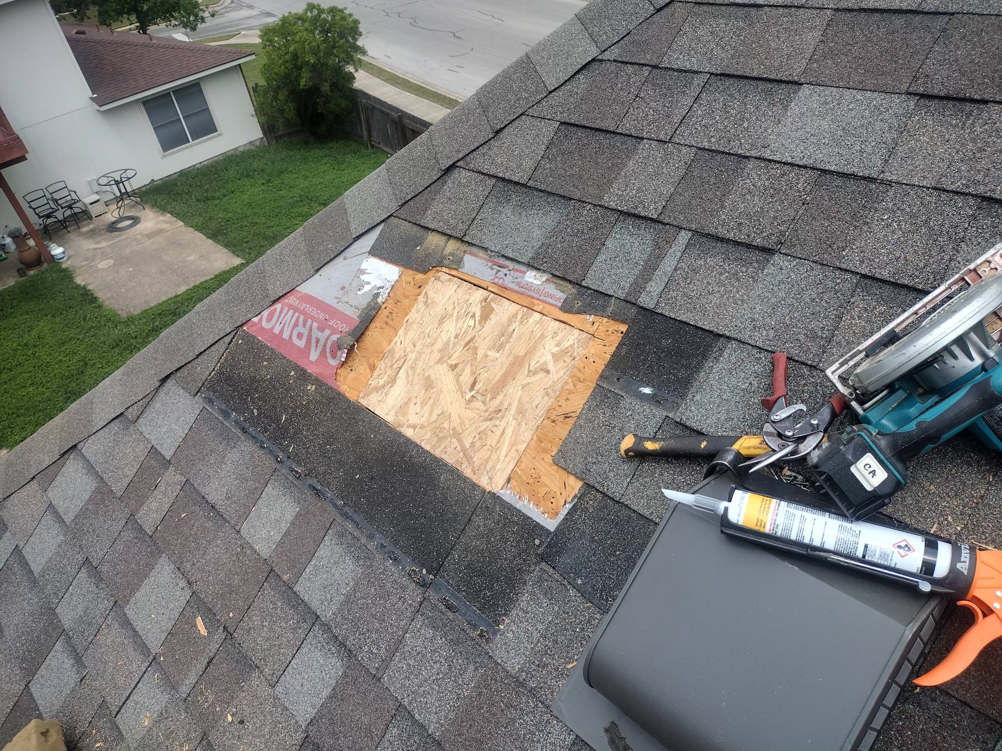 Open roof decking and underlayment during a Roof Royale repair process